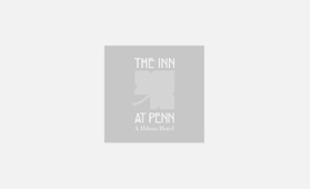 The Inn at Penn, a Hilton Hotel Logo