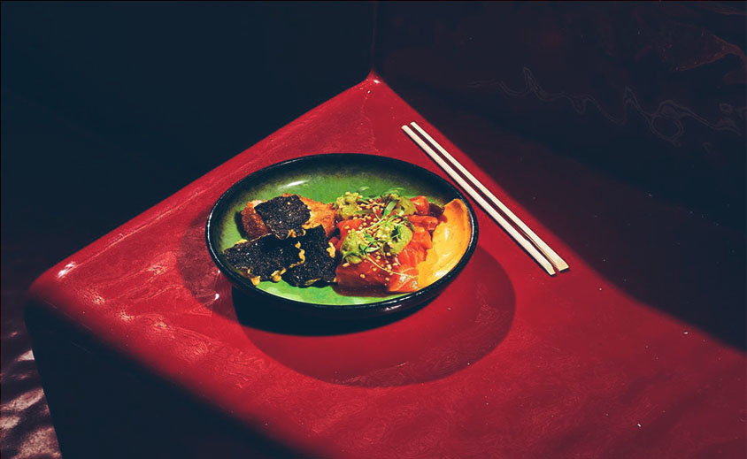 asian food dish with chopsticks