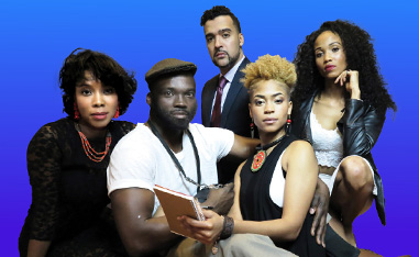 african american performers sitting in a group in front of a blue background