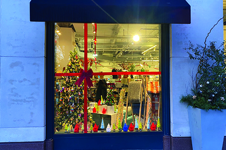 window decorated with tree and lights