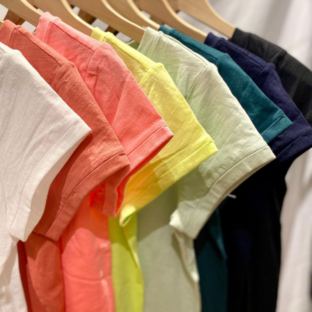 colorful t-shirts on hangers