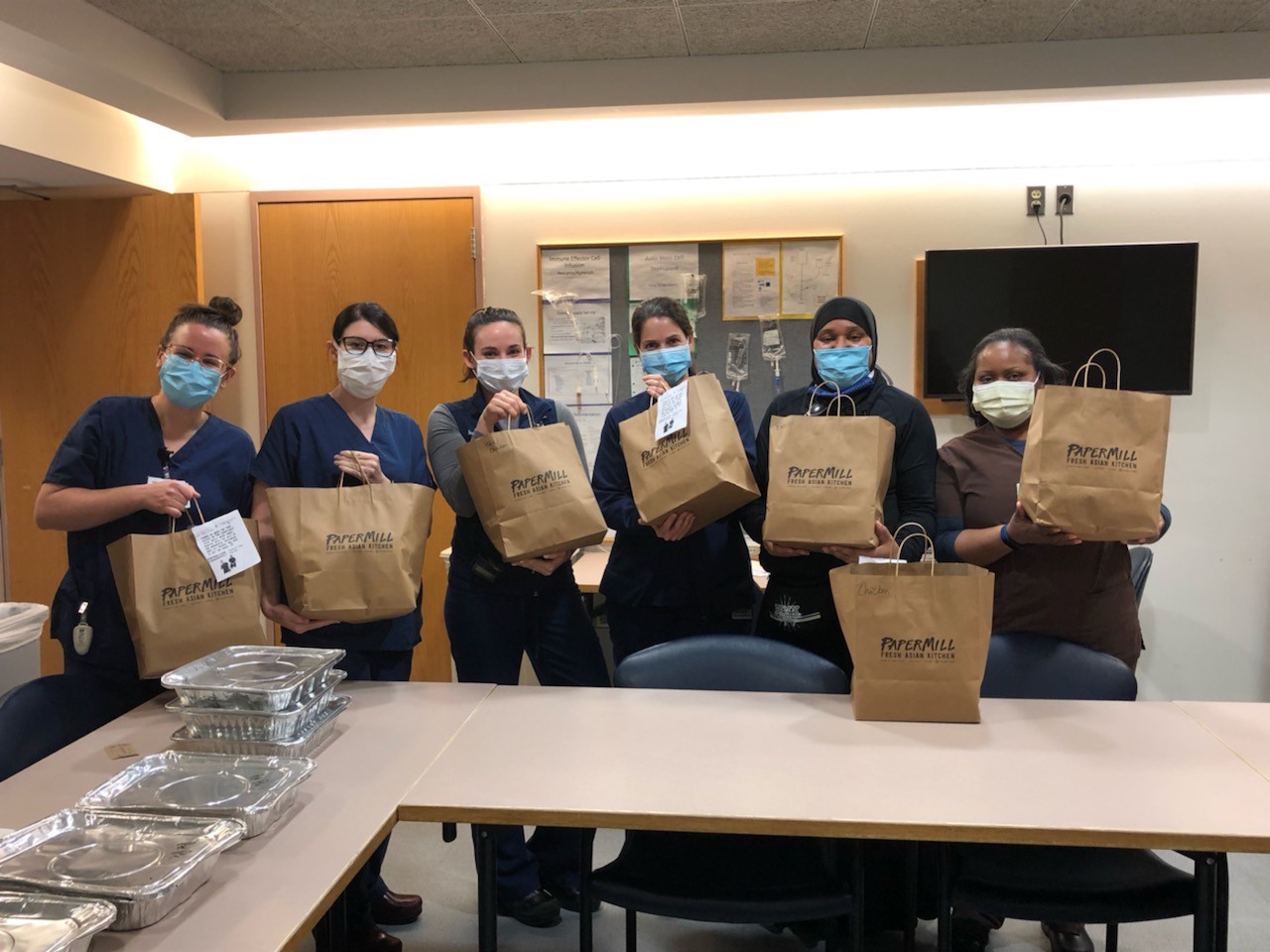 medical professionals receiving food