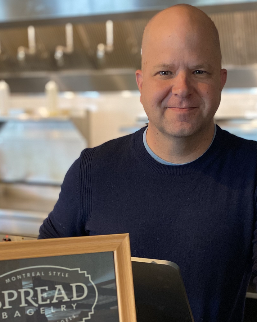 bald man in kitchen