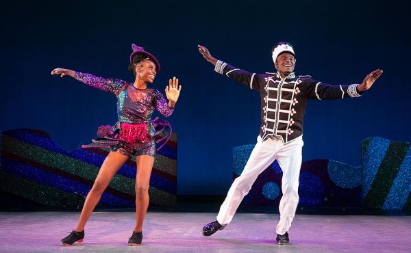 dancers performing in holiday costumes