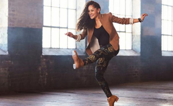 woman dancing in open warehouse space