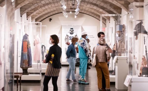 people viewing exhibit in musuem