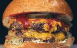hamburger with two patties, pickles ketchup and mustard