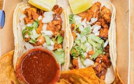 chicken tacos in flour tortillas with chips and salsa